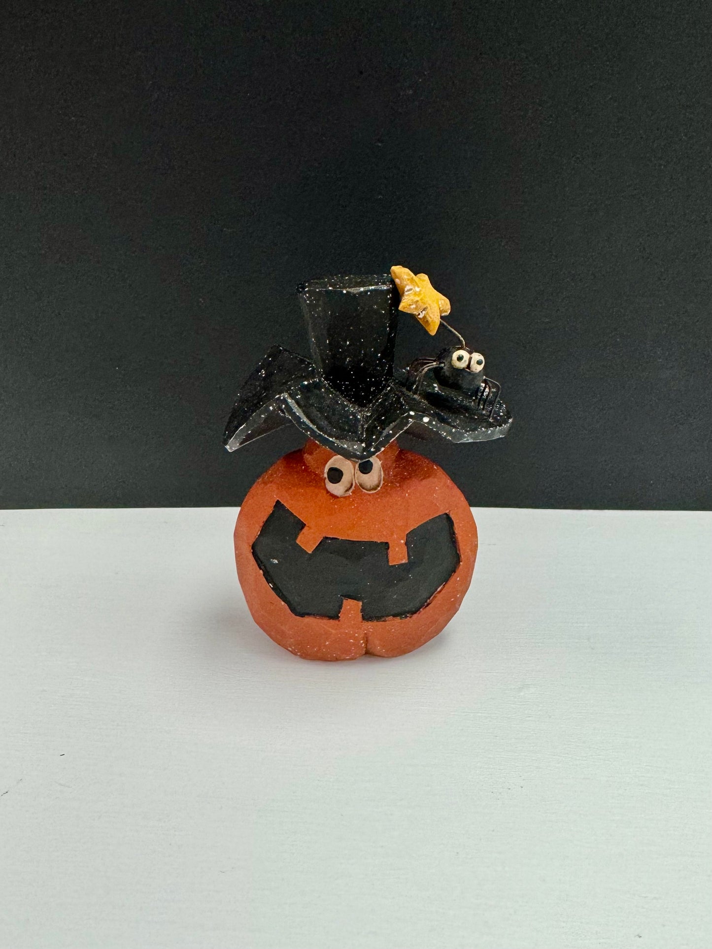 Smiling Pumpkin with Spider Hat Folk Art Figurine